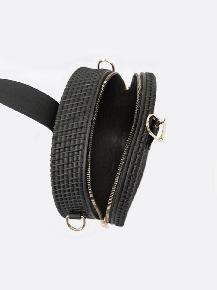 Bolso redondo de piel 