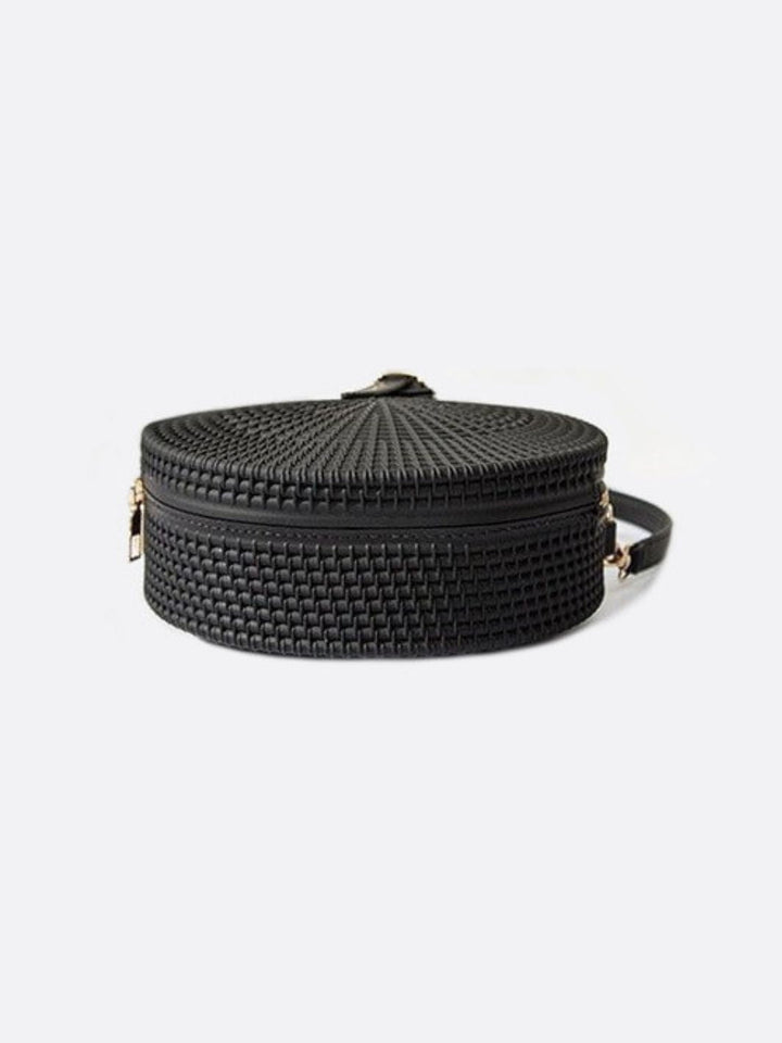 Bolso redondo de piel 