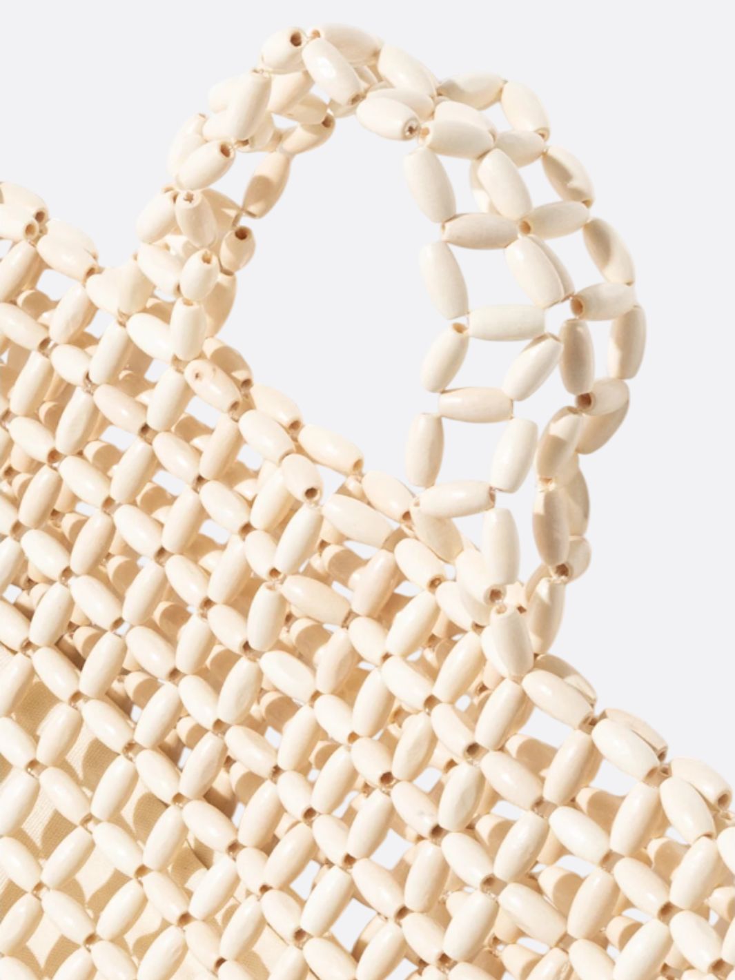 Bolso de mano con perlas