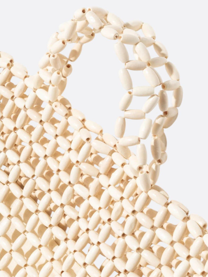 Bolso de mano con perlas