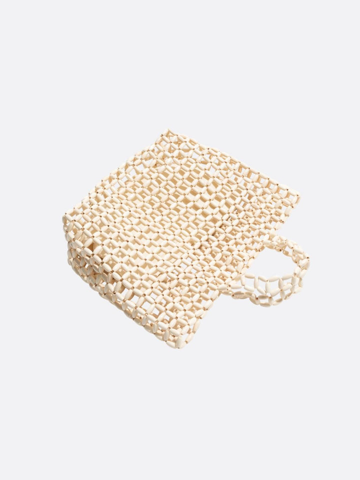 Bolso de mano con perlas